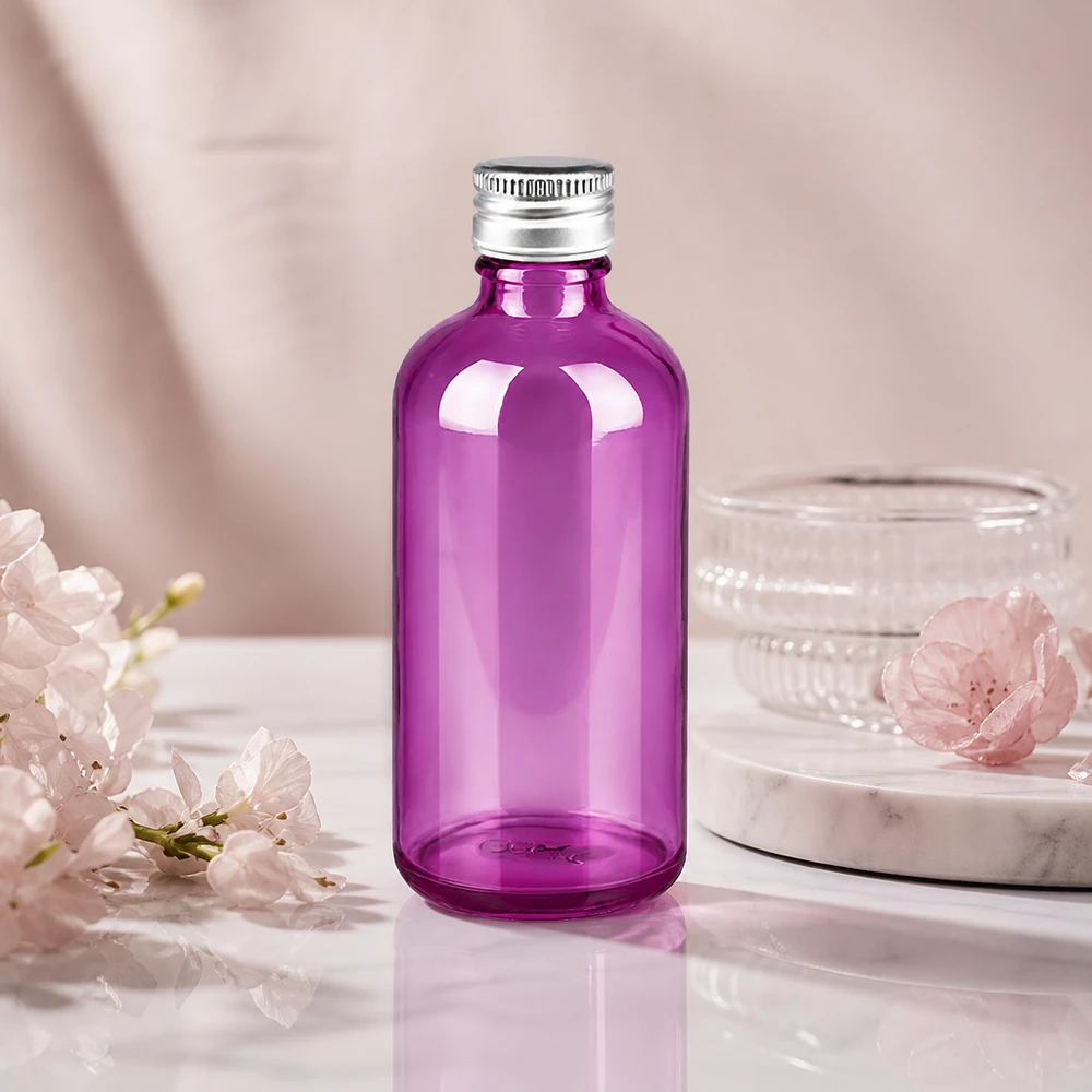 Elegante botella redonda de vidrio de 100 ml en color morado con cuello estrecho de 11 mm para una dosificación precisa