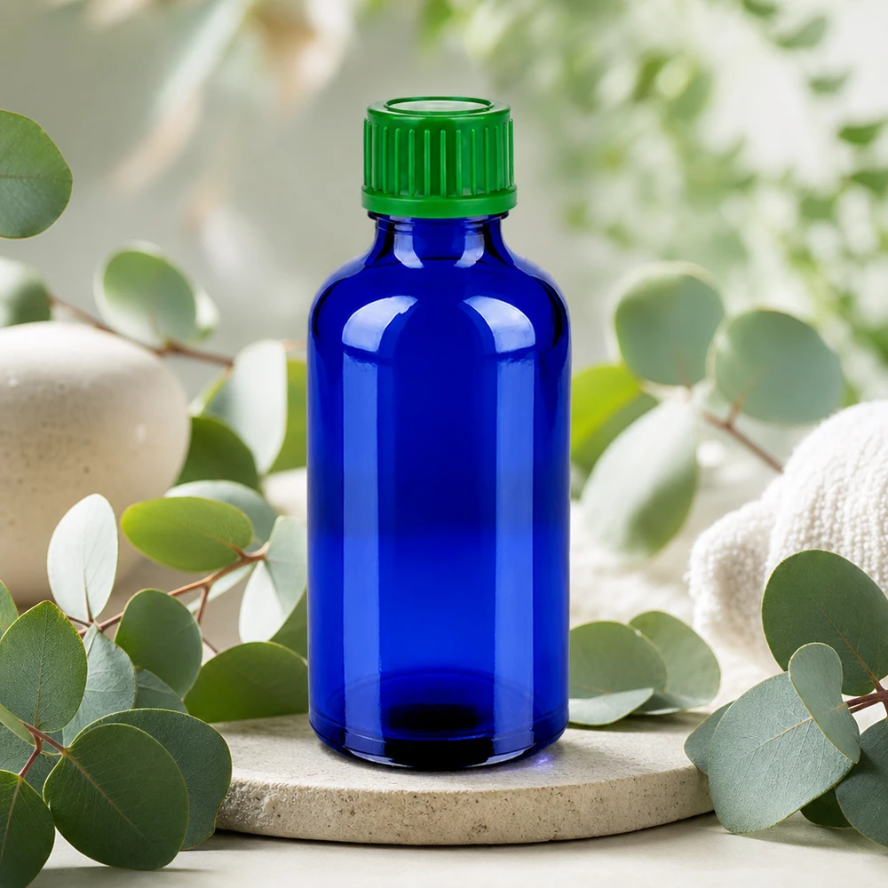 Frasco de vidrio cobalto de 50 ml de alta calidad con tapón verde para productos cosméticos profesionales