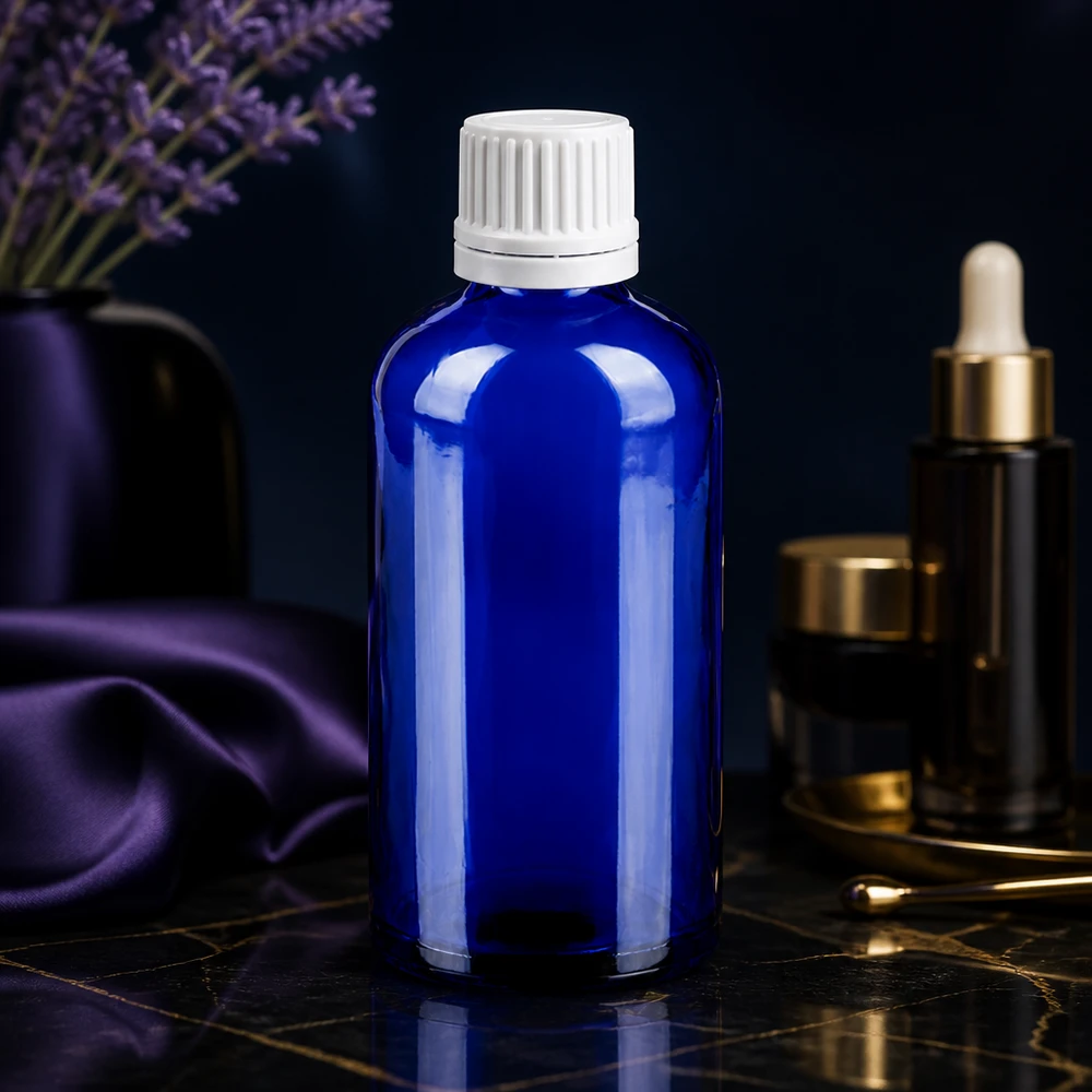 Frasco cuentagotas preciso de 100 ml de vidrio azul con protección UV y tapón blanco para laboratorios y farmacias