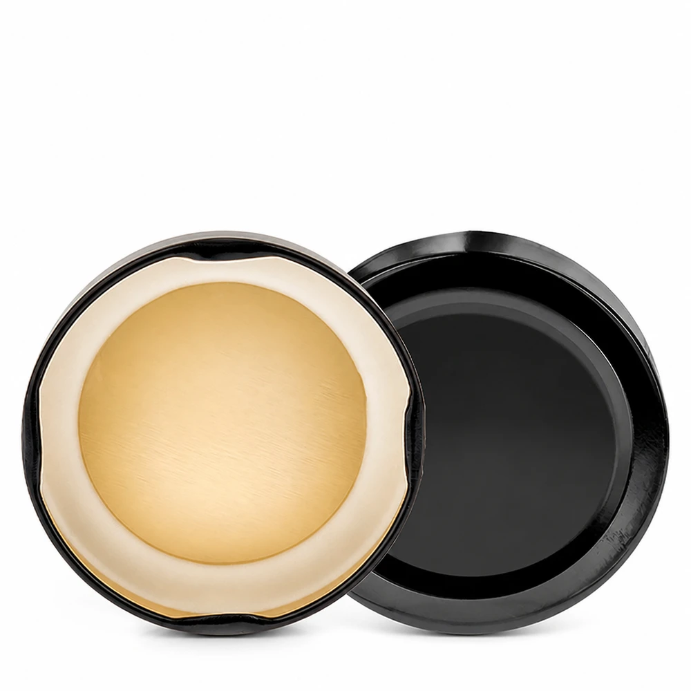 Tapa BasicSeal de 58 mm, negra, TO58deep, UNiTWIST, abierta; vista interior con junta dorada