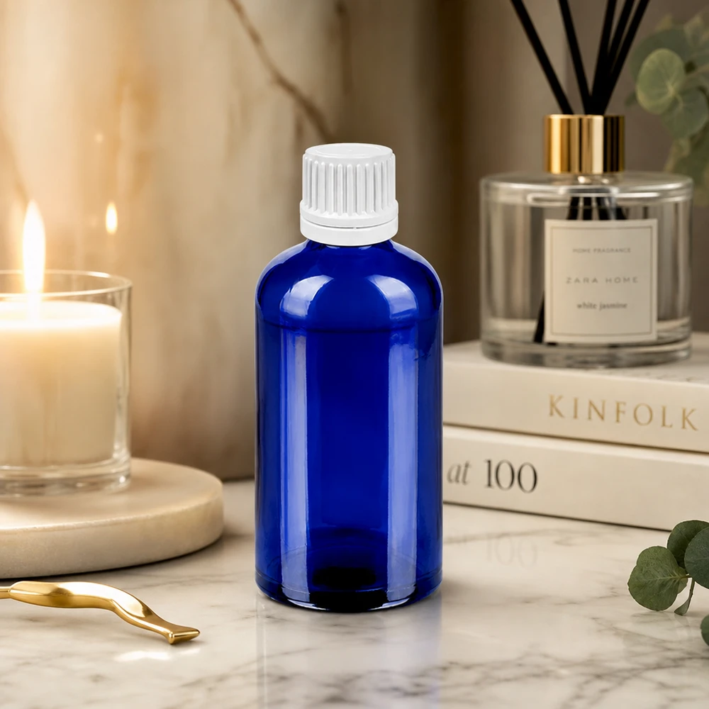 Frasco cuentagotas de 100 ml con tapón inviolable blanco de 0,7 mm BlueLine UT18/100 Frasco cuentagotas preciso de 100 ml de robusto vidrio de cobalto con tapón blanco para una dosificación controlada