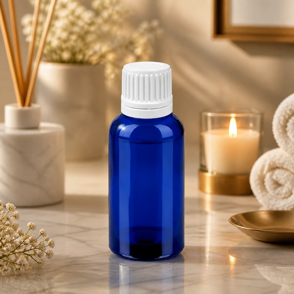 Frasco gotero azul de 30 ml con tapón blanco para aceites esenciales y aromaterapia