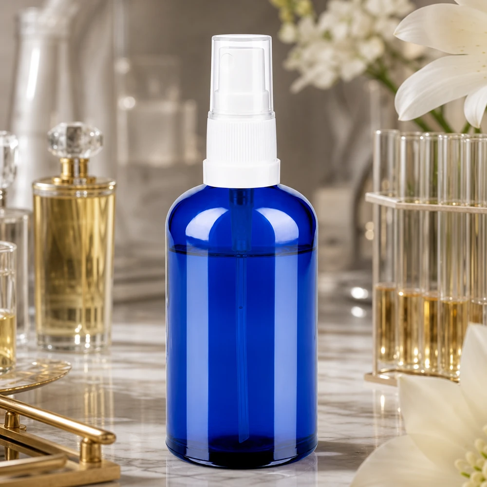 Frasco pulverizador 100ml blanco/transparente tapón estándar BlueLine UT18/100 Frasco pulverizador azul transparente de 100 ml con atomizador blanco ideal para perfumes y ambientadores