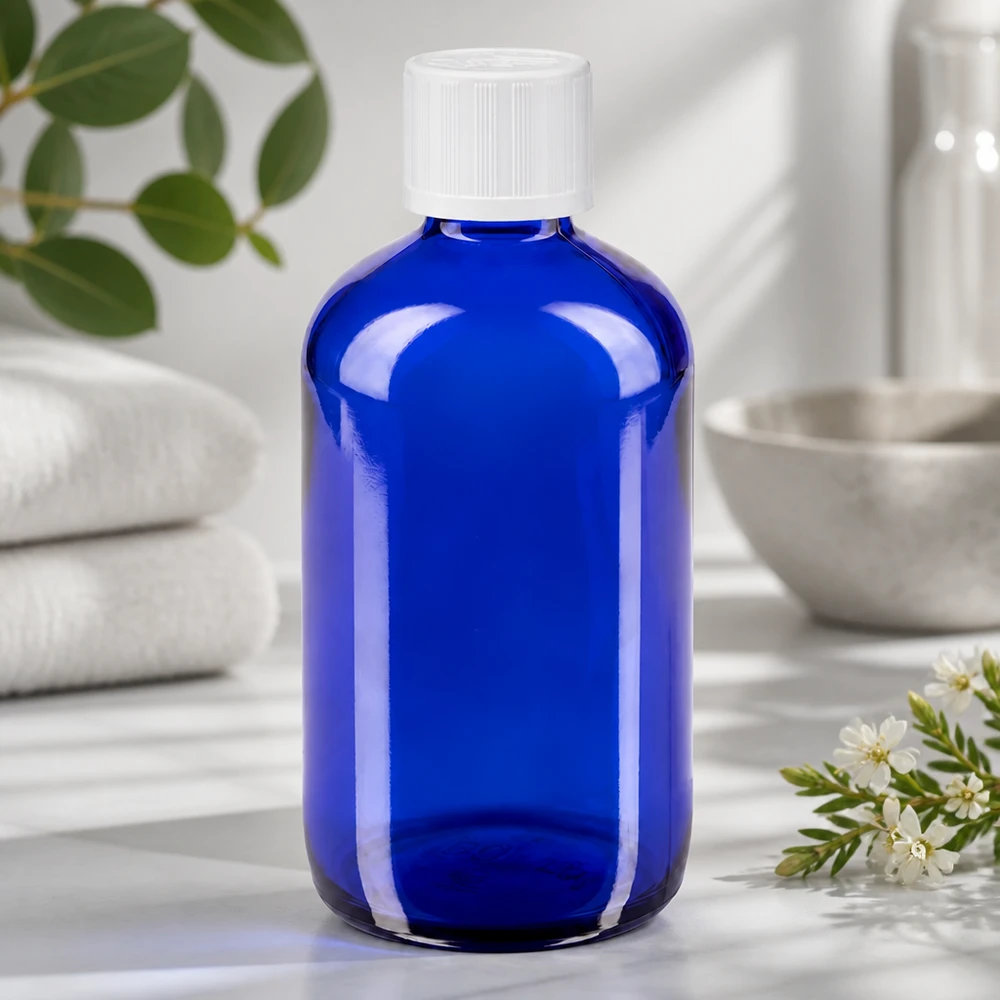 Botella de farmacia azul 100ml tapón cuentagotas blanco a prueba de niños estándar Frasco de cristal azul transparente de 100 ml con tapón de seguridad para niños de color blanco y gotero de 1,2 mm