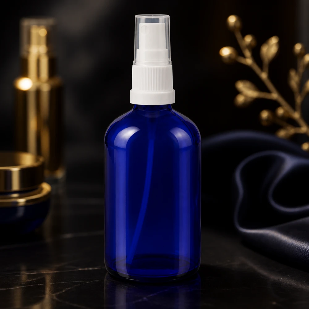 Botella de farmacia azul 100ml tapón de rosca blanco Frasco de cristal azul cobalto de 100 ml con pulverizador blanco y tapón protector transparente