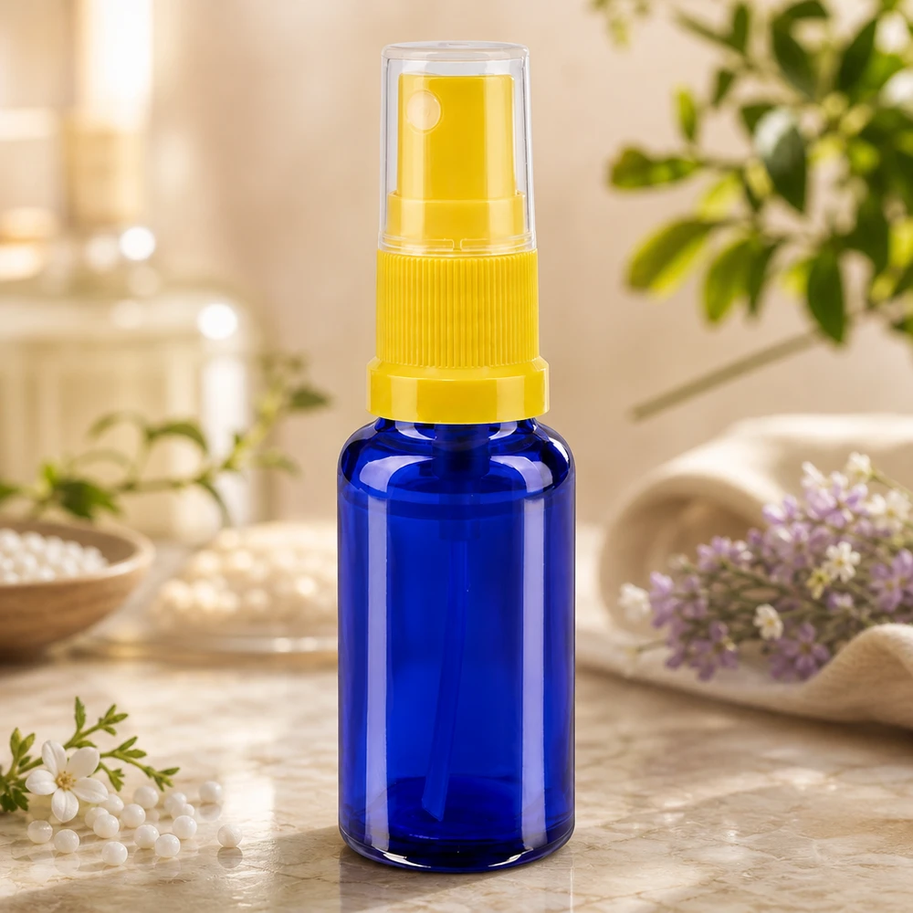 Botella pulverizadora compacta de 20 ml, de vidrio azul con protección UV y cabezal de bombeo amarillo, para farmacias