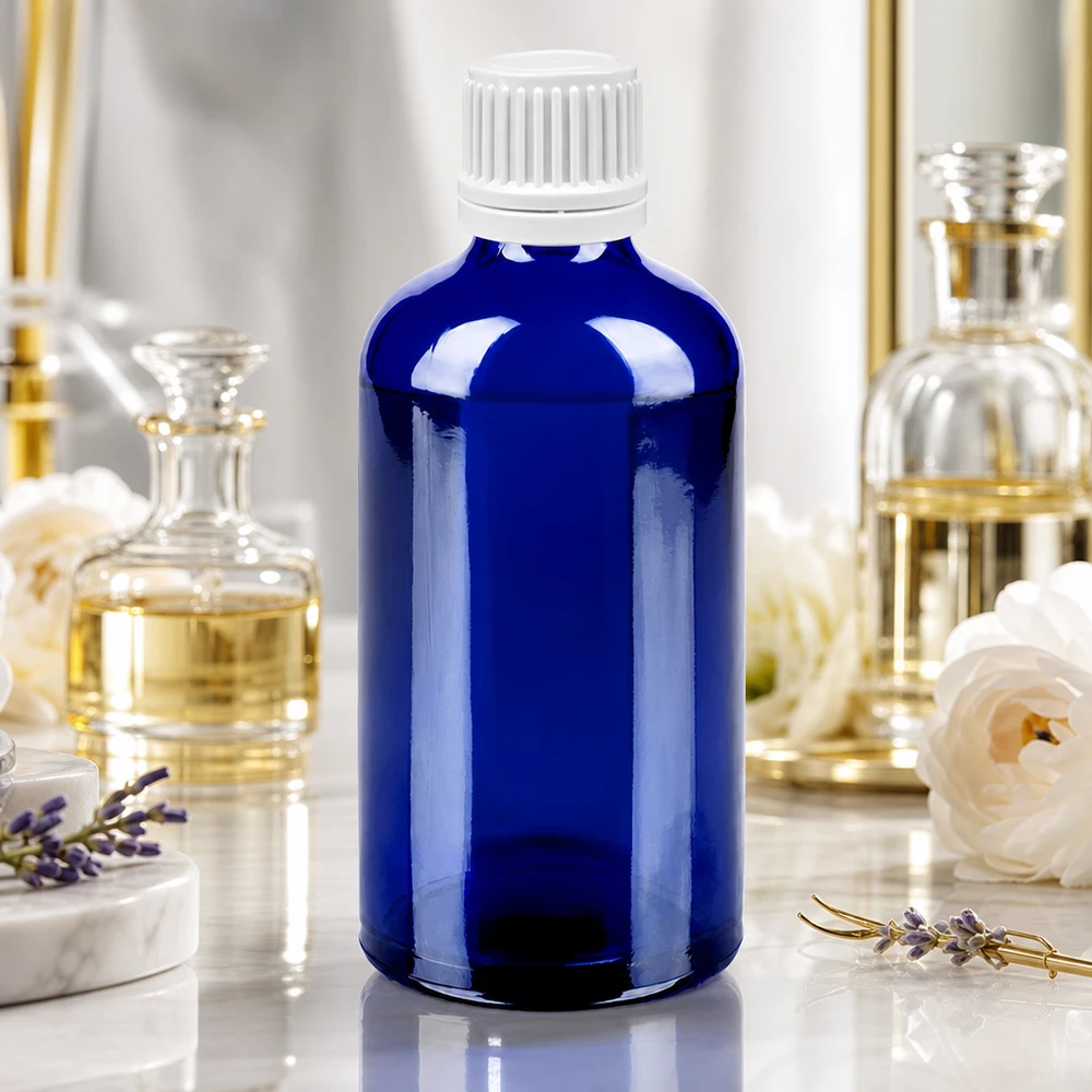 Frasco de vidrio de 100 ml de alta calidad en azul oscuro con tapón blanco a prueba de manipulaciones para uso profesional