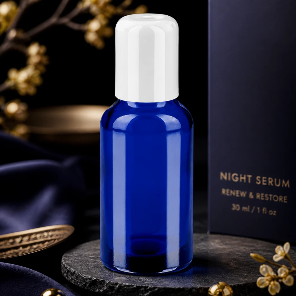 Frasco roll-on 30ml blanco tapón estándar BlueLine UT18/30 Elegante frasco roll-on de 30 ml en azul cobalto con tapón de rosca blanco para productos cosméticos de primera calidad