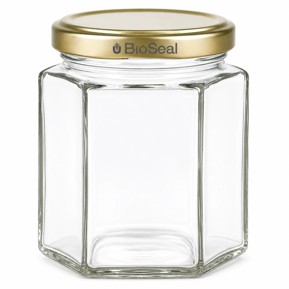 Tarro para miel de 250 g con tapa dorada BioSeal UNiTWIST Tarro de miel de 250 g hexagonal con tapón de rosca dorado BioSeal tarro de cristal transparente vacío para miel