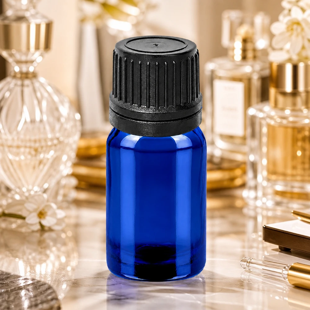 Pequeño frasco cuentagotas de 5 ml de vidrio azul con tapón de rosca negro para cosmética y aromaterapia