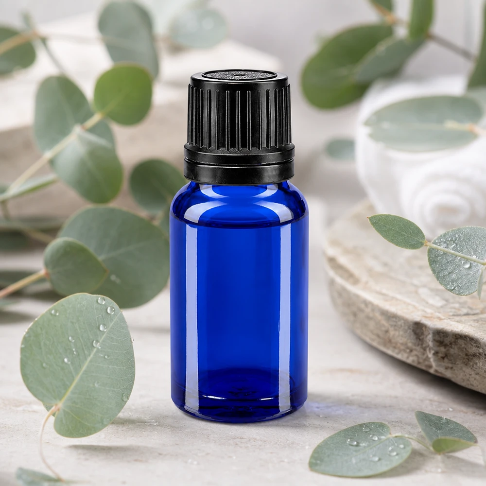 Frasco azul cobalto de 10 ml con tapón de rosca negro y gotero de 1 mm para aceites esenciales