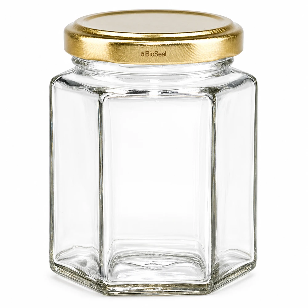 Tarro hexagonal UNiTWIST Hexa196 con tapa dorada TO58 BioSeal de vidrio transparente vacío