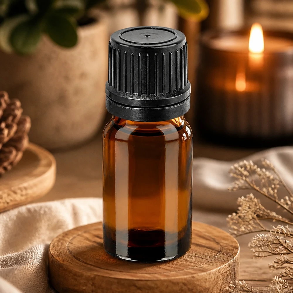 Pequeño frasco de cristal de 5 ml con tapón cuentagotas para una dosificación precisa de aceites y esencias