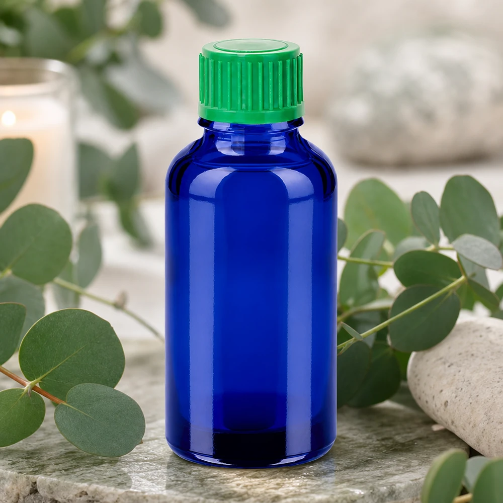 Frasco de vidrio de 30 ml de elegante color azul con práctico tapón de rosca verde
