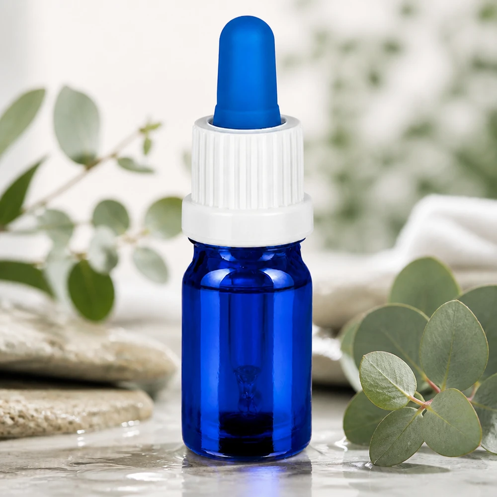 Pequeño frasco pipeta de 5 ml de vidrio azul con tapón cuentagotas blanco ergonómico