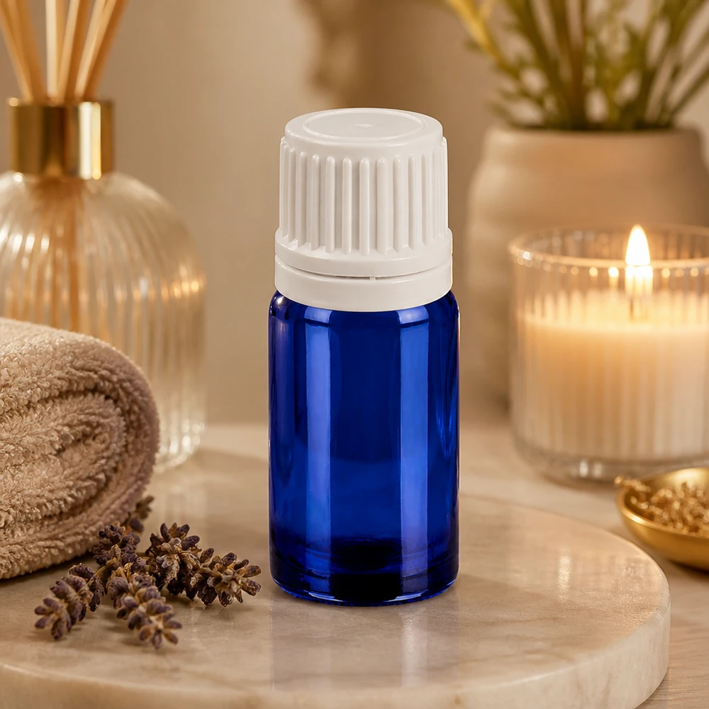 Pequeño frasco cuentagotas de 5 ml de vidrio azul con tapón blanco OV18 para aromaterapia