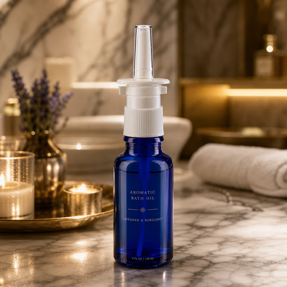Frasco de farmacia para spray nasal de 20 ml en azul cobalto con dosificador blanco, ideal para un ambiente de baño lujoso