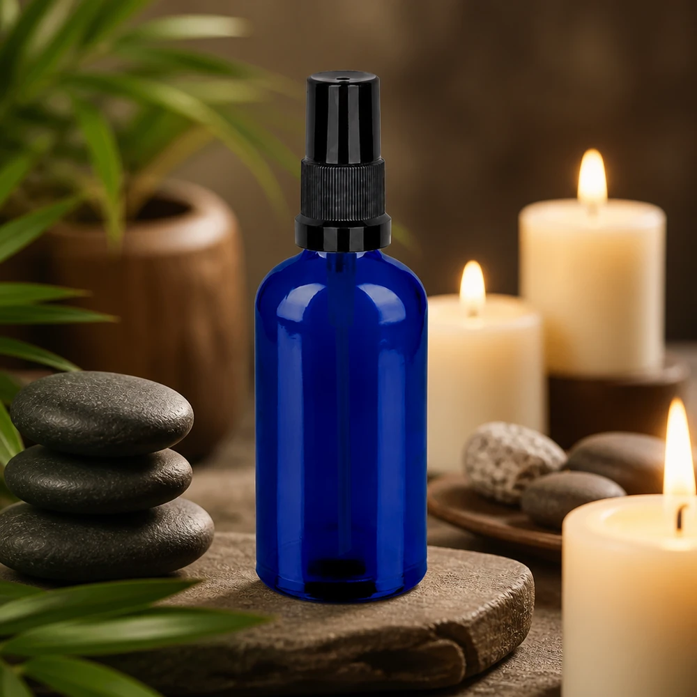 Frasco pulverizador de 100 ml negro con tapón estándar BlueLine UT18/100 Elegante botella pulverizadora azul de 100 ml con diseño ergonómico, ideal para aplicaciones de bienestar y spa