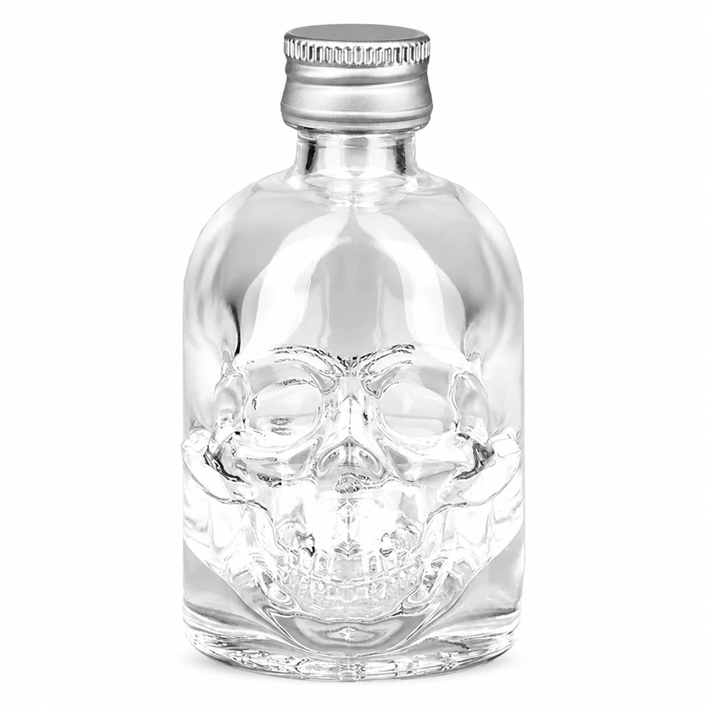 Botella de cristal Hector de 50 ml con relieve de calavera y tapón de rosca UNiTWIS plateado sobre fondo blanco