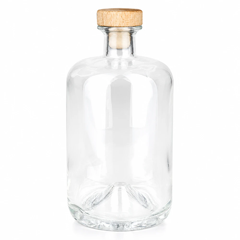 Botella de farmacia de 700 ml «Sofia» con tapón de corcho con asa de madera UNiTWIST® Botella de cristal de 700 ml Sofia con asa de madera corcho UNiTWIST transparente vacía sobre fondo blanco