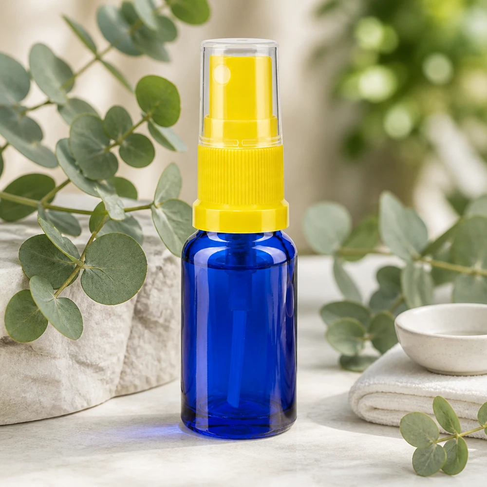 Botella de farmacia azul 30ml tapón pulverizador amarillo Frasco de cristal azul de 30 ml para farmacias, con pulverizador amarillo y tapón protector transparente