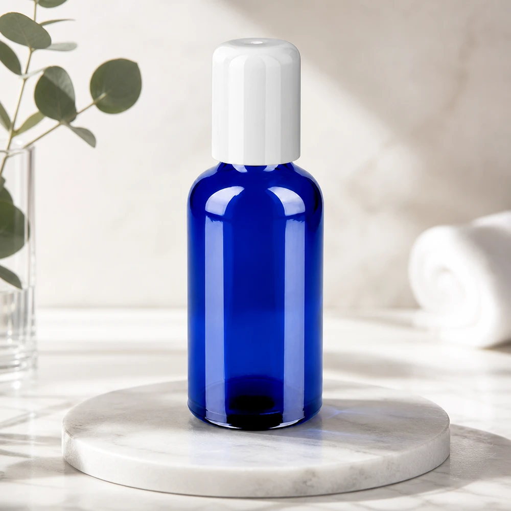 Frasco roll-on de vidrio azul cobalto de 50 ml STD BlueLine con tapón blanco para uso móvil