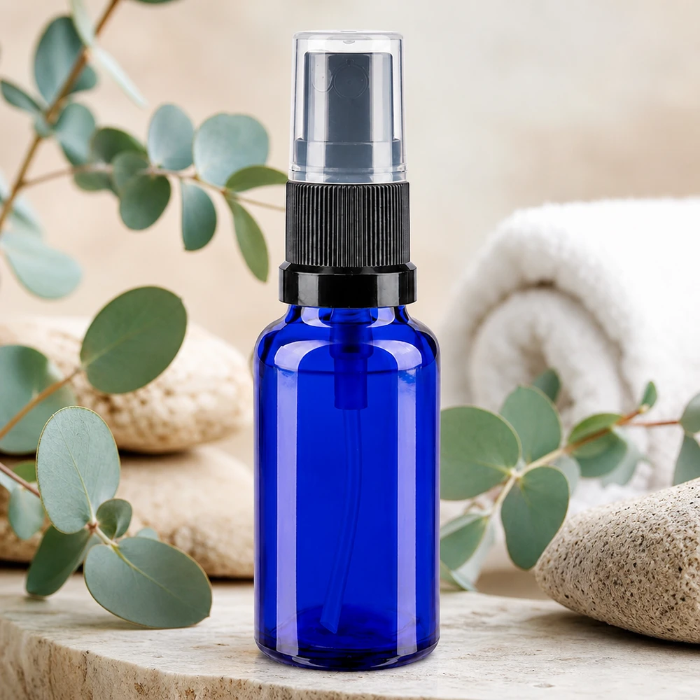 Botella de farmacia azul 20ml pulverizador negro Botella pulverizadora compacta azul de 20 ml, fabricada en vidrio con protección UV, con cabezal pulverizador negro y tapón transparente