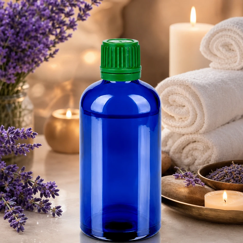 Botella 100ml 11mm tapón rosca verde precinto BlueLine UT18/100 Frasco boticario azul cobalto de 100 ml con tapa verde ideal para aromaterapia y bienestar