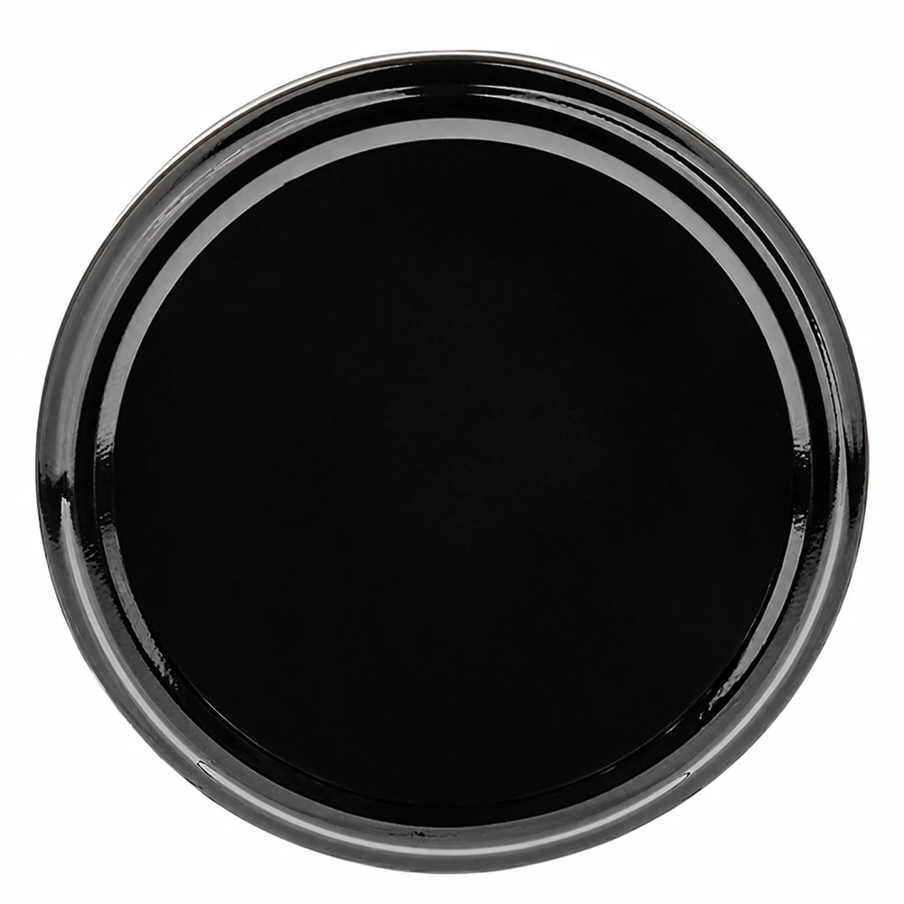 Tapa BasicSeal de 70 mm, negra (TO70) UNiTWIST Tapa de rosca BasicSeal de 70 mm, negra, modelo TO70. Vista superior de la tapa metálica brillante para tarros de conserva