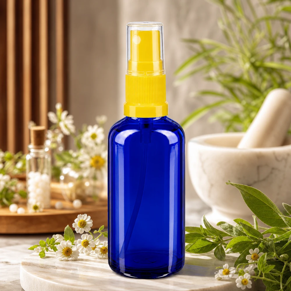 Botella de farmacia azul 50ml pulverizador superior amarillo Frasco azul de farmacia con pulverizador de 50 ml, fabricado en vidrio con protección UV y con cabezal pulverizador transparente de color amarillo