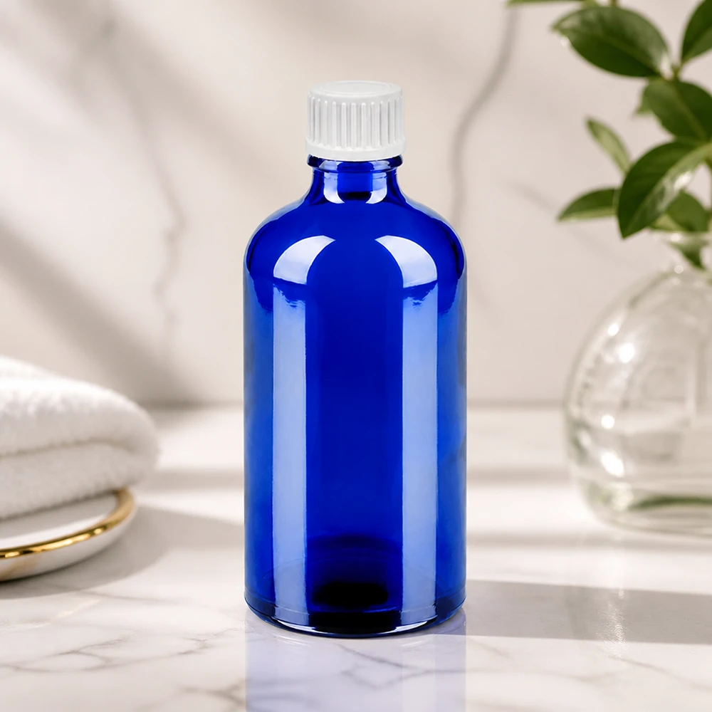 Frasco cuentagotas de 100 ml con cierre estándar blanco de 0,9 mm BlueLine UT18/100 Elegante botella de vidrio azul de 100 ml con tapón cuentagotas blanco para un almacenamiento con estilo BlueLine UT18