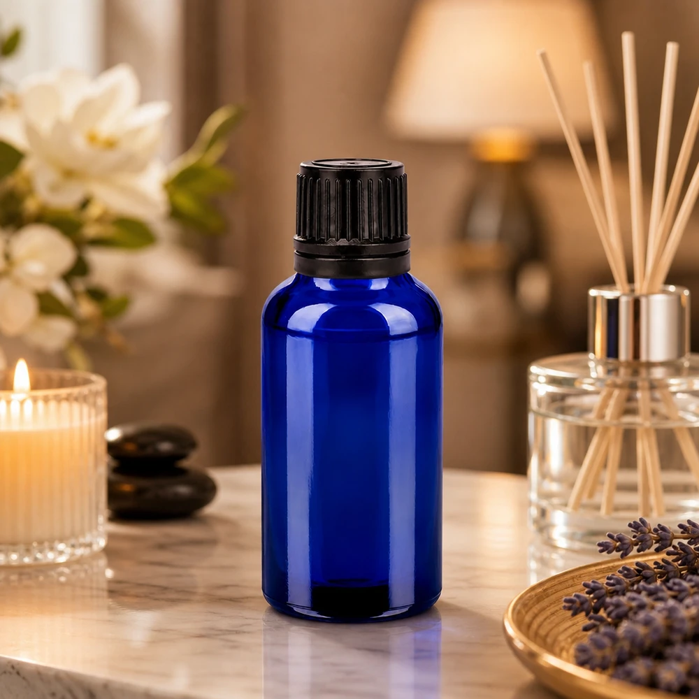 Frasco de vidrio BlueLine de 30 ml con cuello roscado de 11 mm para una dosificación precisa de los aceites esenciales
