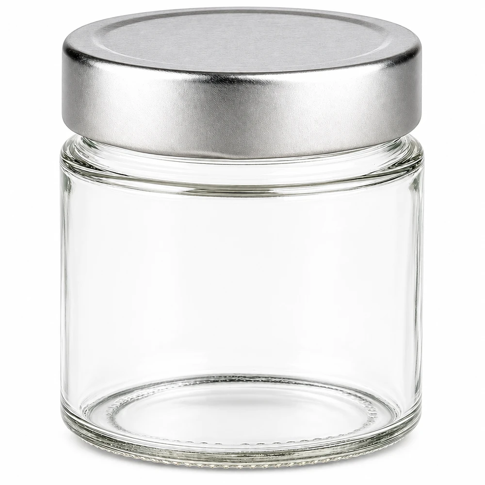 Tarro redondo de 135 ml con tapa plateada BasicSeal vacío sobre fondo blanco Tarro de cristal para almacenamiento