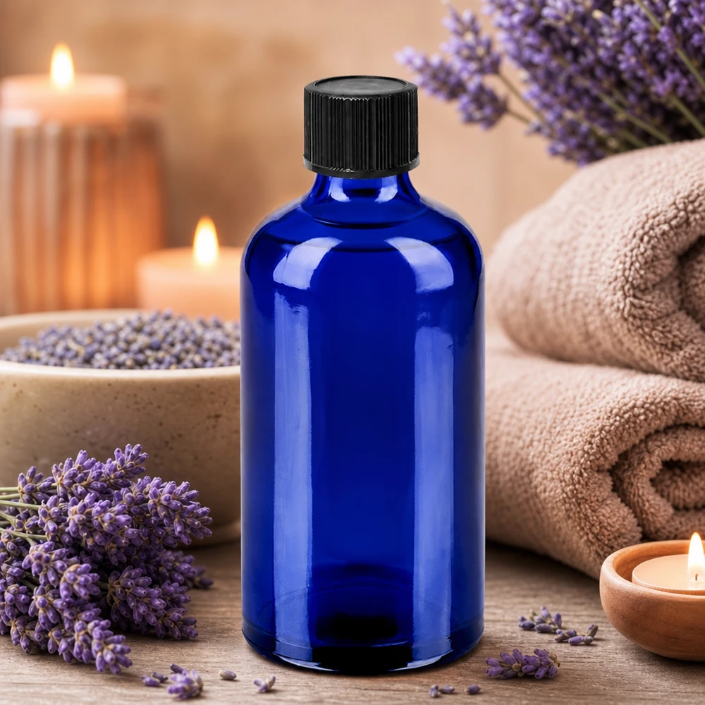 Frasco de farmacia de 100 ml en azul cobalto con tapón cuentagotas negro para aromaterapia y bienestar
