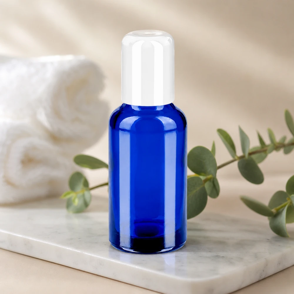 Frasco roll-on de 30 ml con tapón STD blanco de vidrio azul brillante para cosméticos