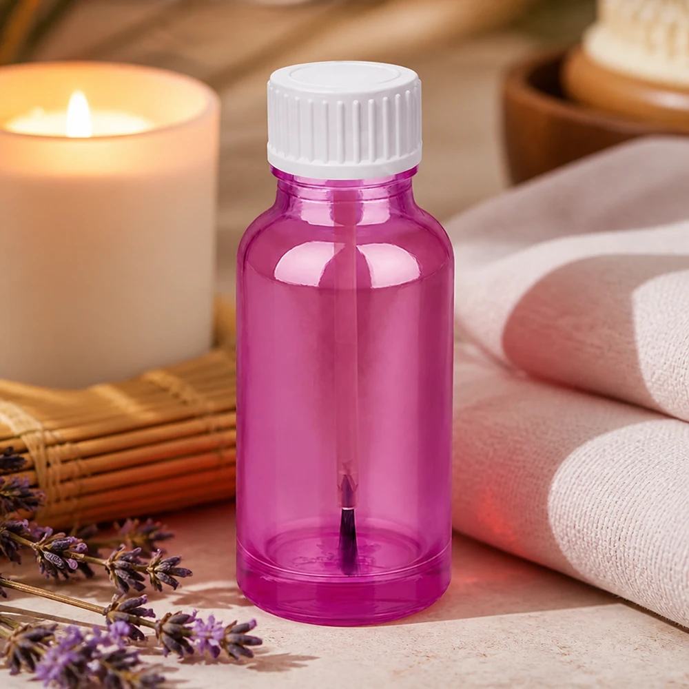 Pequeño frasco pincel de 20 ml con tapón de rosca blanco ideal para una aplicación cosmética precisa