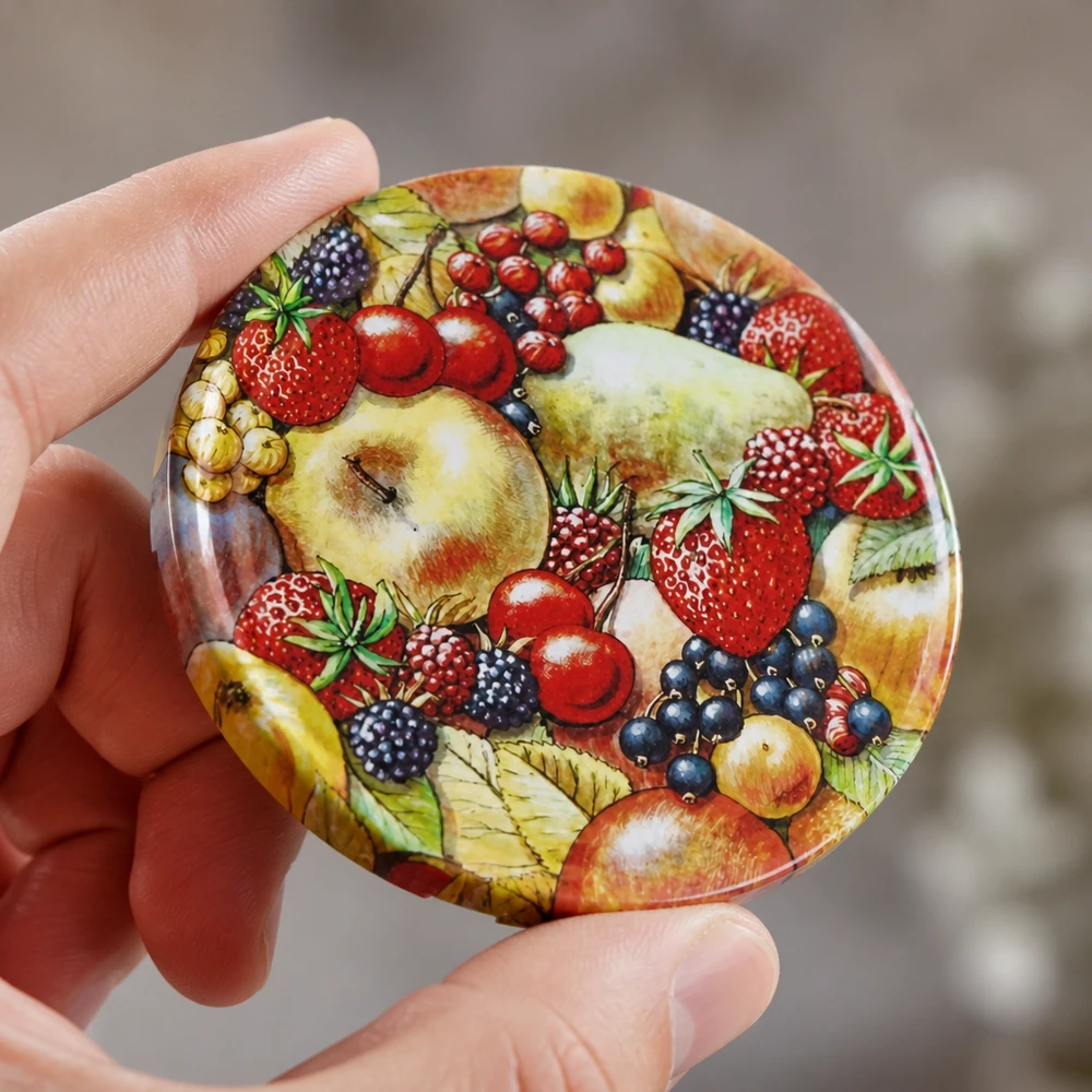 Ilustración de frutas muy detallada en una tapa redonda para conservas BasicSeal TO82 UNiTWIST de 82 mm