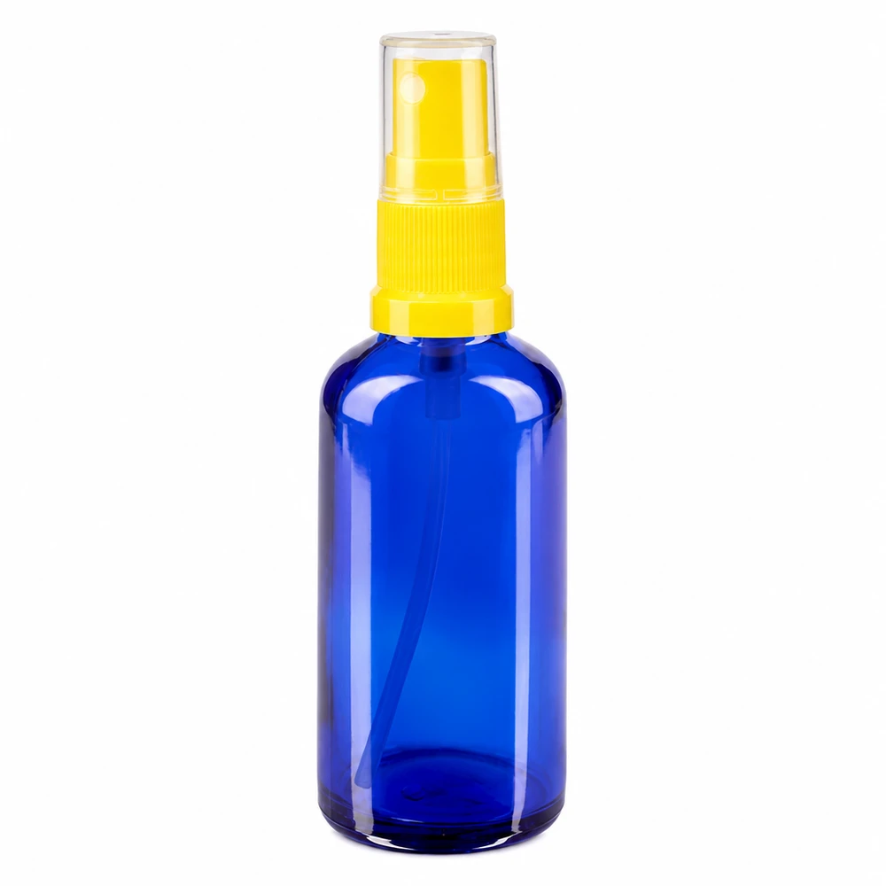 Frasco pulverizador de cristal azul de 50 ml con cabezal pulverizador amarillo para farmacias y cosmética
