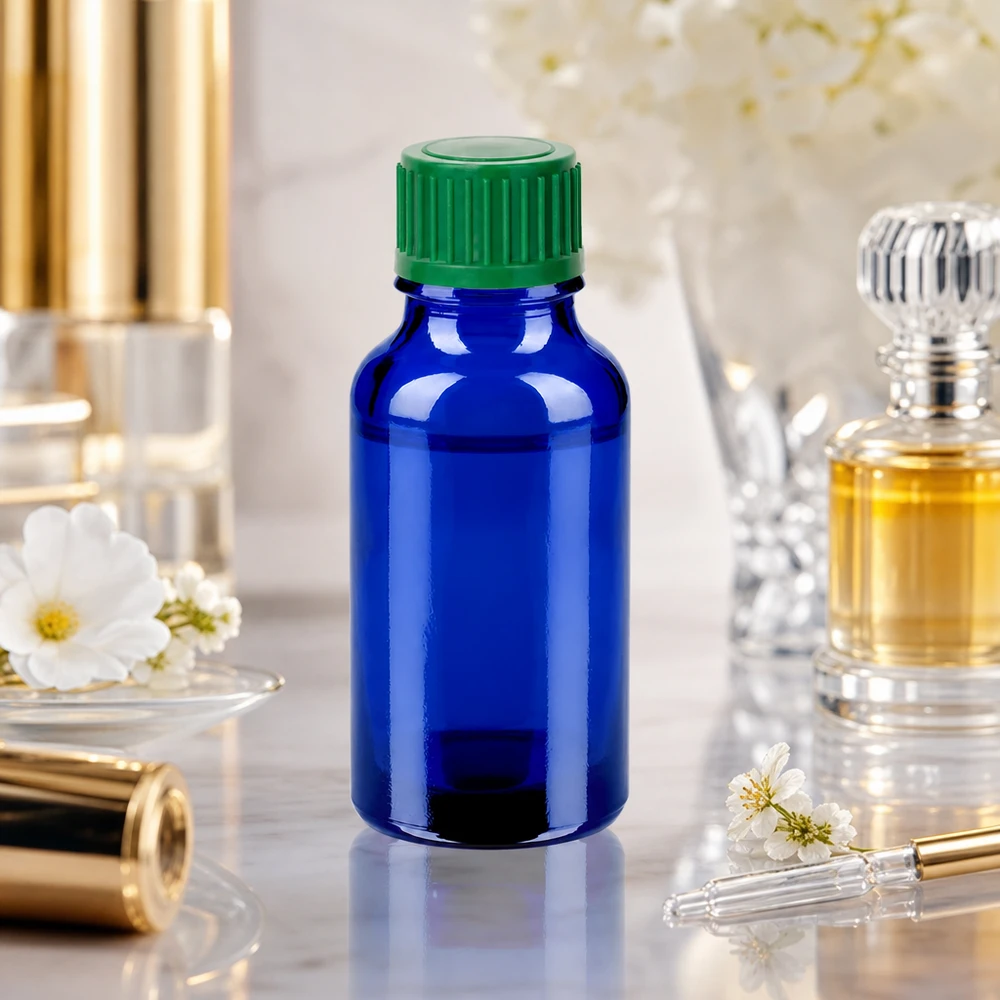 Frasco cuentagotas de 20 ml de vidrio azul con protección UV y tapón de rosca verde para un almacenamiento seguro