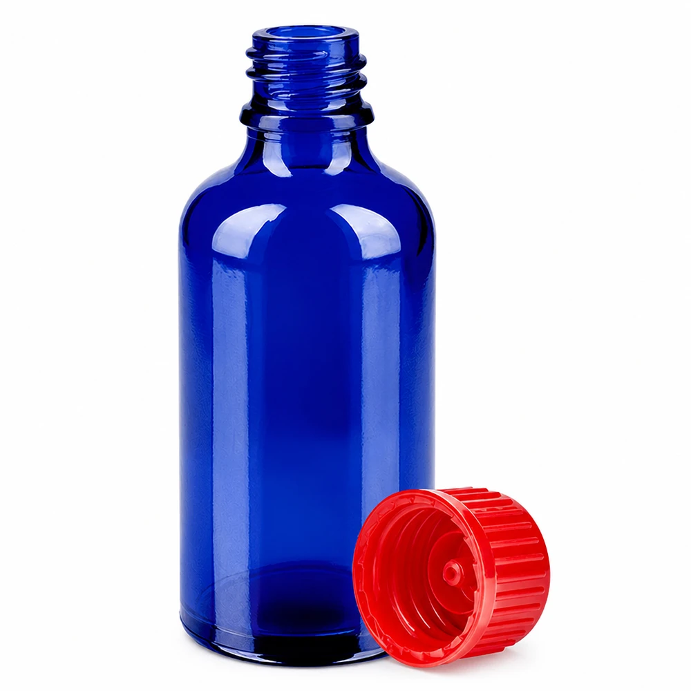 Pequeño frasco de laboratorio de 50 ml en azul cobalto con tapón rojo brillante para una dosificación precisa
