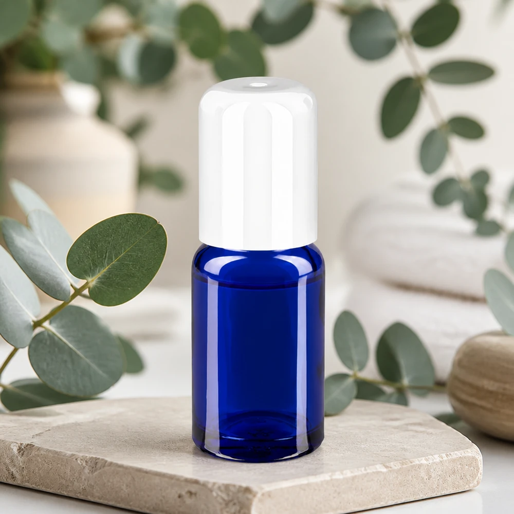 Frasco roll-on compacto de 10 ml en elegante azul ideal para aromaterapia y cosmética natural