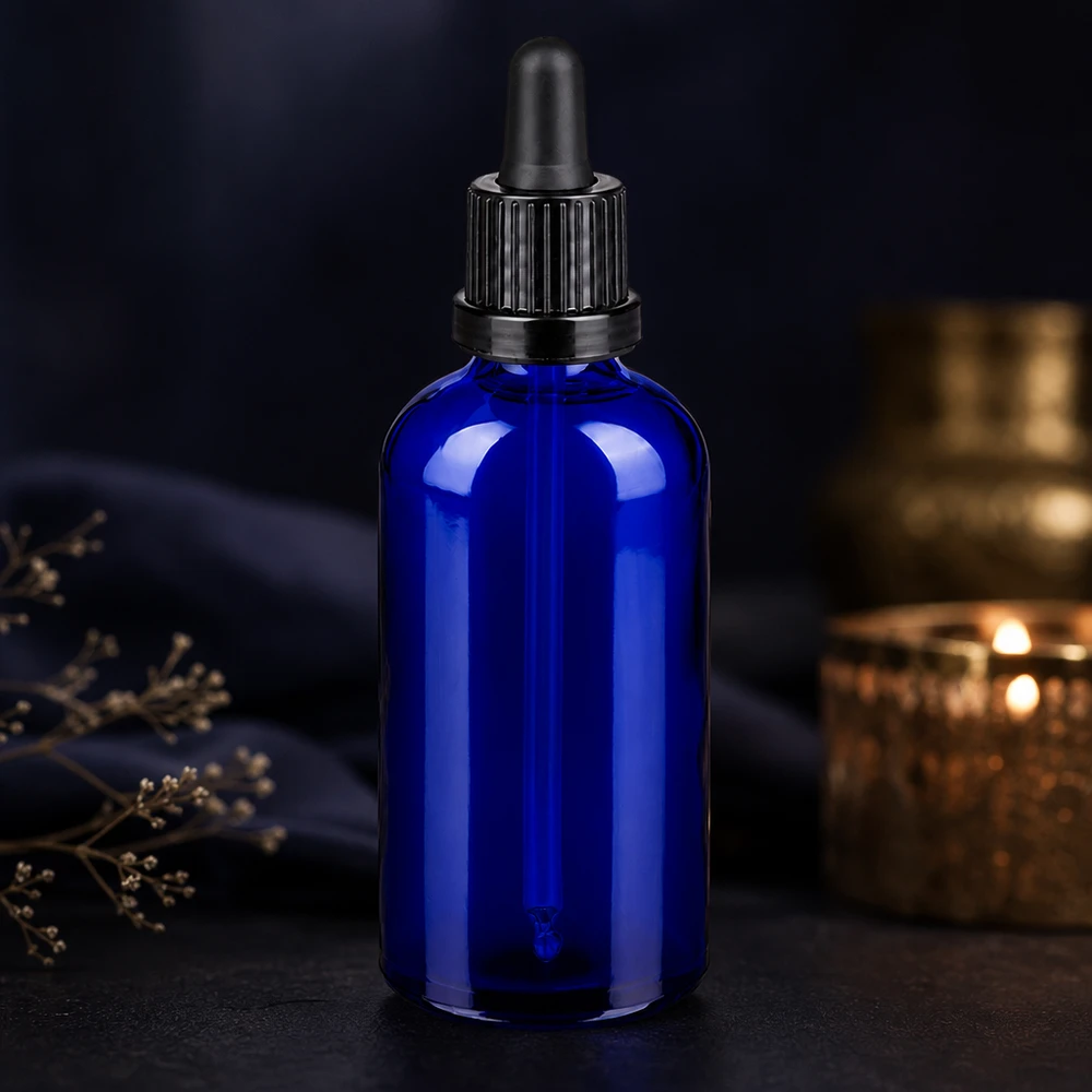 Frasco pipeta 100ml cierre inviolable negro BlueLine UT18/100 Elegante botella de cristal azul de 100 ml con pipeta de goma negra para una presentación elegante del producto