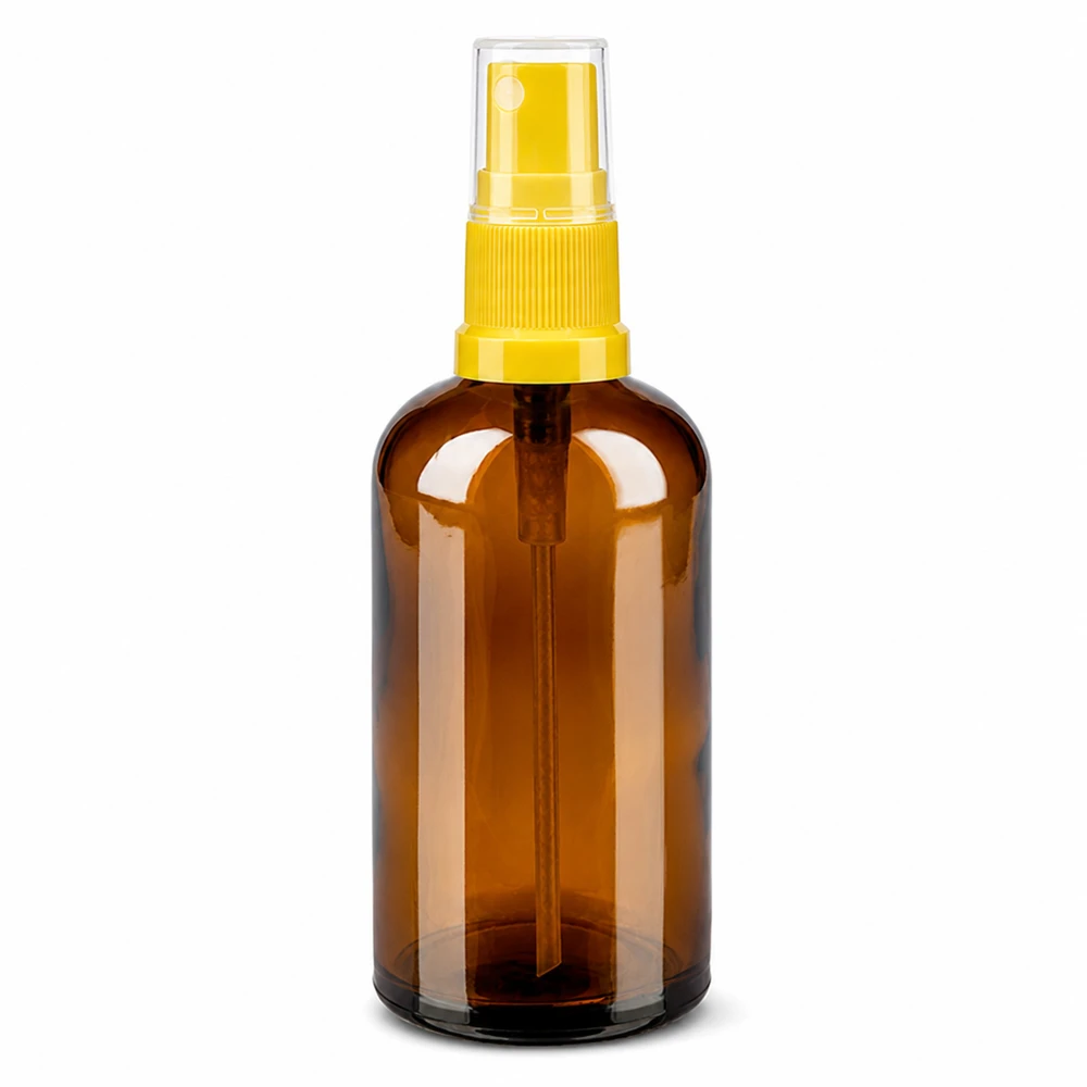 Botella pulverizadora de 100 ml marrón transparente con cabezal amarillo para cosméticos y productos de cuidado
