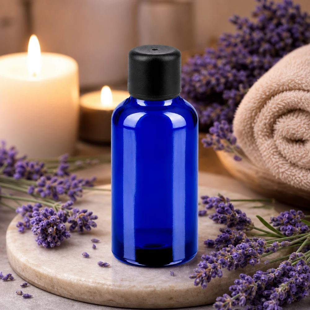 Pequeño frasco boticario de 30 ml en azul cobalto con tapón negro para una dosificación precisa