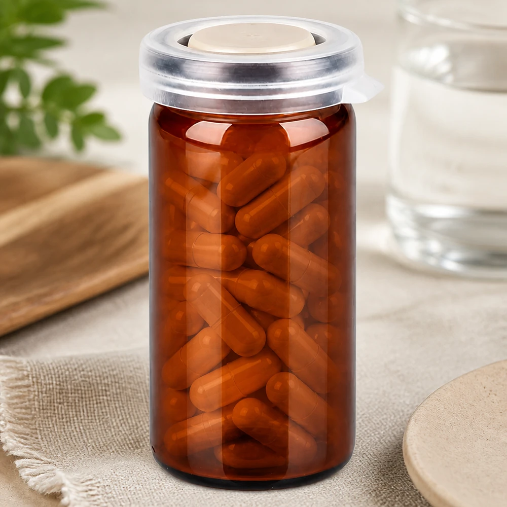 Frasco de farmacia de 10 ml de vidrio ámbar con tapa a presión, lleno de cápsulas marrones