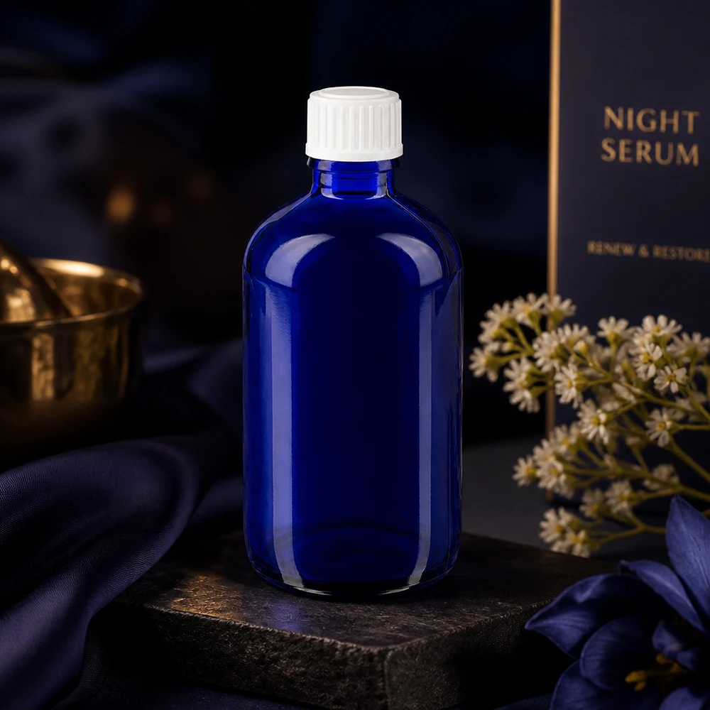 Botella de farmacia azul 100ml tapón rosca blanco estándar Frasco de cristal azul de 100 ml con tapón blanco estándar como envase para el sérum de noche