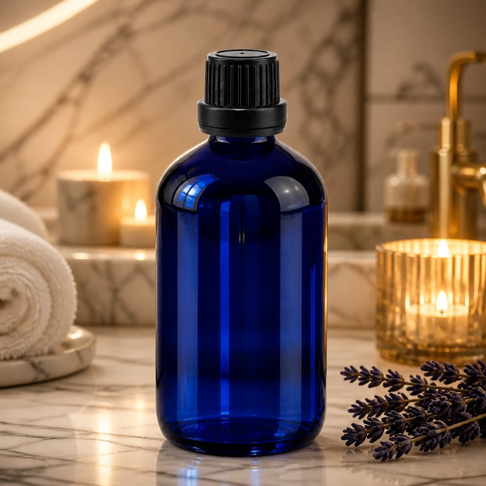 Frasco de cristal azul de 100 ml con tapón de seguridad y gotero para aromaterapia