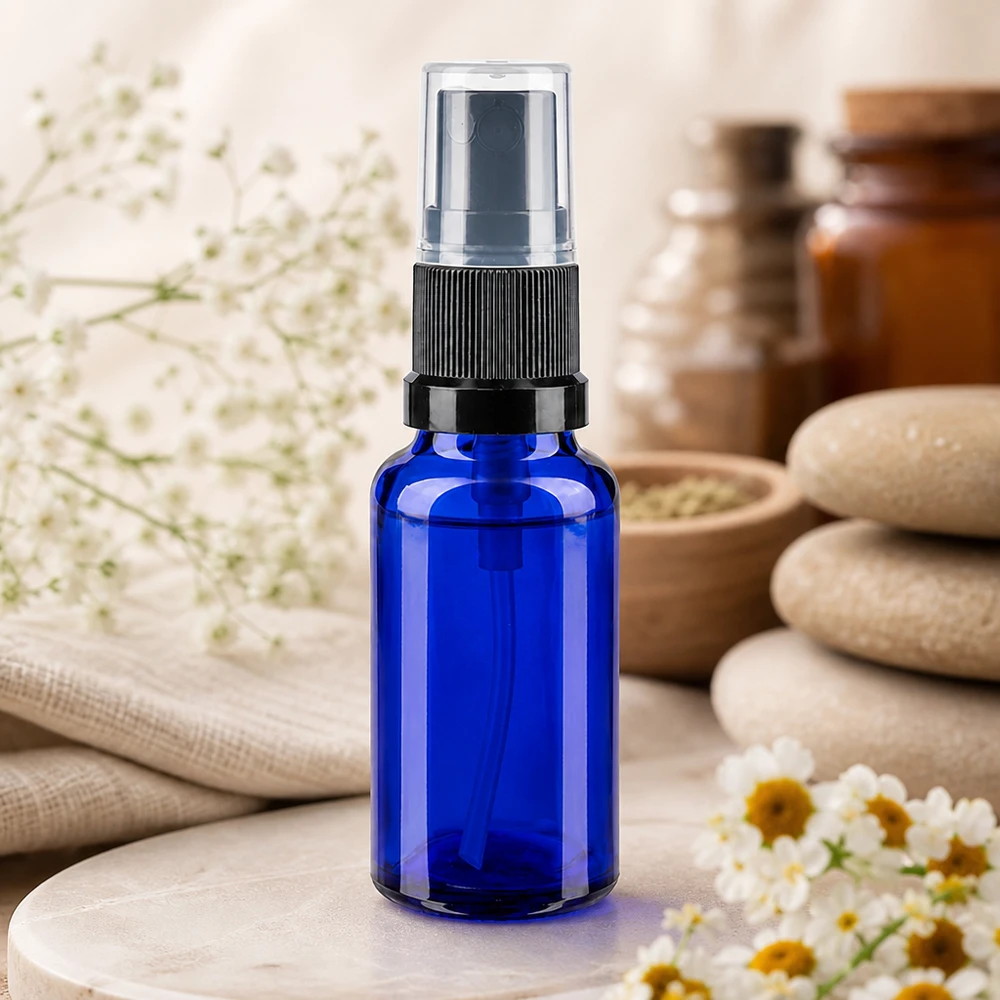 Botella pulverizadora azul de 20 ml de vidrio borosilicato con pulverizador negro, con motivos de mármol y flores