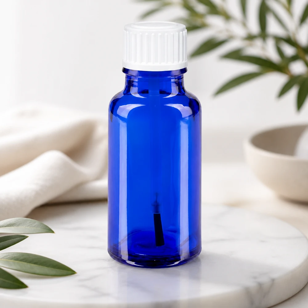 Frasco azul de 20 ml con aplicador de pincel, fabricado en vidrio de farmacia, con tapón de seguridad para niños de color blanco