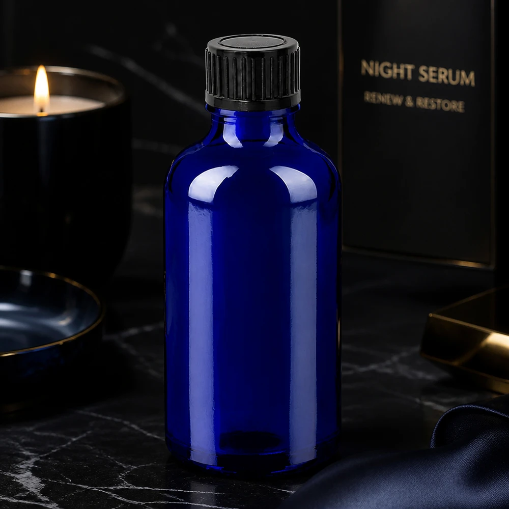 Frasco de cristal compacto de 50 ml de la serie BlueLine para sueros y productos cosméticos en azul cobalto